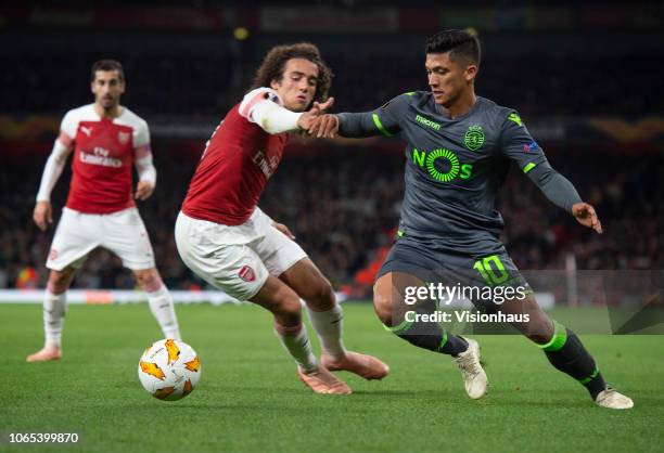 Matteo Guendouzi of Arsenal and Fredy Montero of Sporting CP during the UEFA Europa League Group E match between Arsenal and Sporting CP at Emirates...