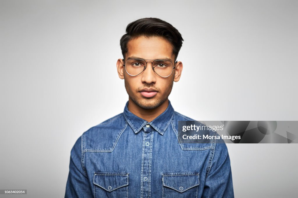 Portrait of young businessman wearing eyeglasses