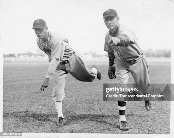 American baseball players Watty Clark and Tom Zachary , both of the Brooklyn Dodgers, as they strike pitching poses during spring training, Orlando,...