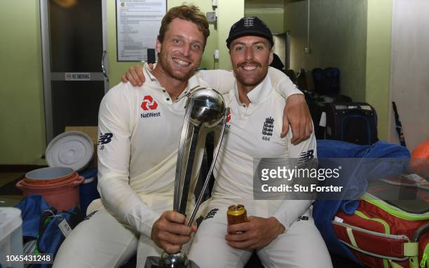 England vice captain Jos Buttler and Jack Leach with the trophy in the dressing room after their 3-0 series victory after Day Four of the Third Test...