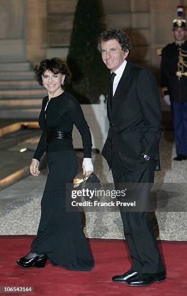 Jack Lang and his wife Monique Buczynski arrive to attend a state dinner honouring visiting Chinese President Hu Jintao at Elysee Palace on November...
