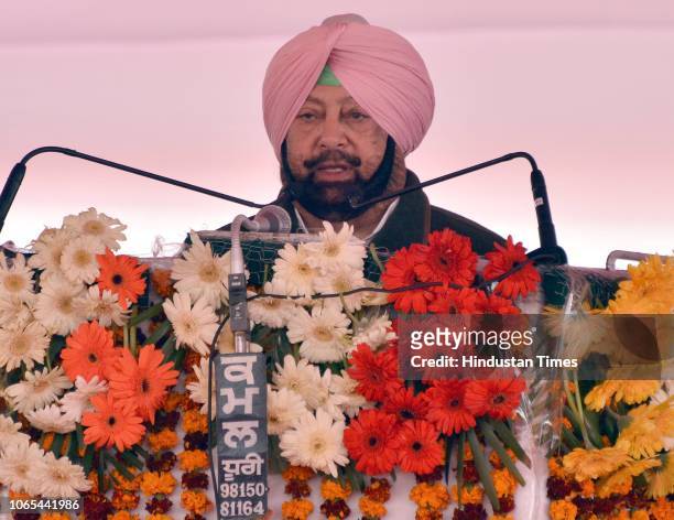 Punjab Chief Minister Captain Amarinder Singh addresses during the foundation laying ceremony of Kartarpur corridor at Dera Baba Nanak in district...
