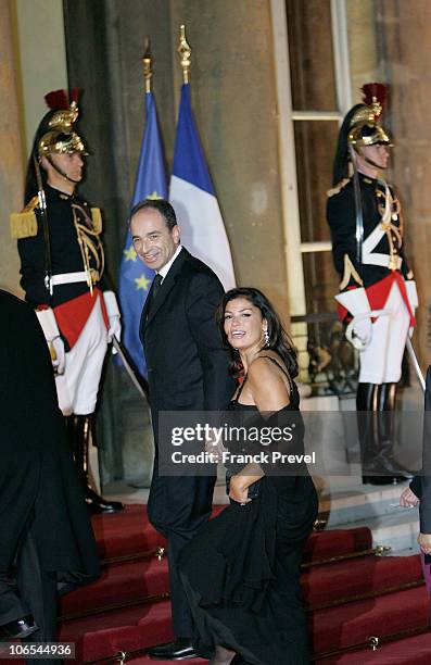 Jean-Francois Cope, President of the UMP group at the National Assembly and his wife Nadia arrive to attend a state dinner honouring visiting Chinese...