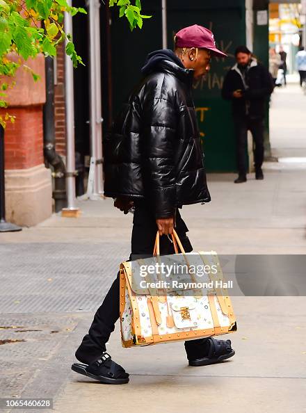 Singer Travis Scott is seen walking with a Louis Vuitton Handbag in  Photo d'actualité - Getty Images