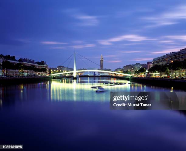 cityscape view of le havre with suspension bridge at dusk - seine maritime photos et images de collection