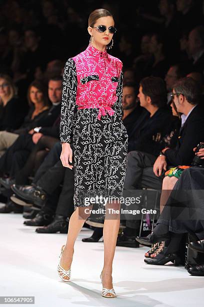 Model wearing a design by Duro Olowu walks the runway during the second day of the Charles Vogele Fashion Days on November 4, 2010 in Zurich,...