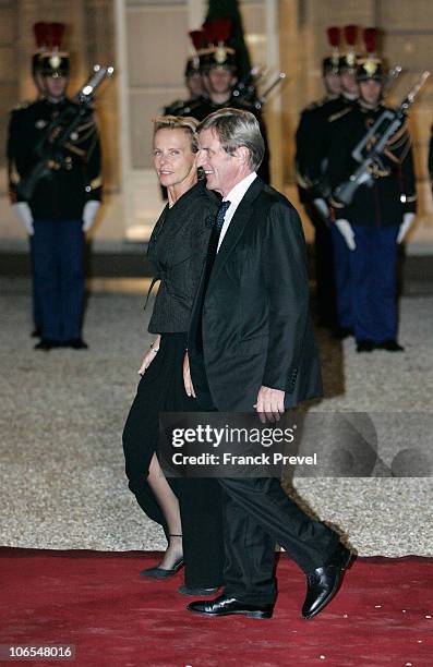 French Foreign Minister Bernard Kouchner and his wife Christine Ockrent arrives to attend a state dinner honouring visiting Chinese President Hu...