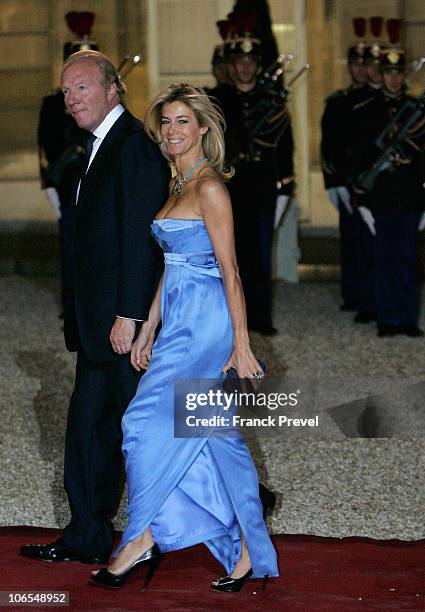 French Interior Minister Brice Hortefeux with his wife Valerie arrive to attend a state dinner honouring visiting Chinese President Hu Jintao at...