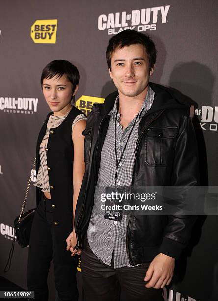 Actress Zelda Williams and Actor Alex Frost arrive at the Call Of Duty: Black Ops Launch Party held at Barker Hangar on November 4, 2010 in Santa...