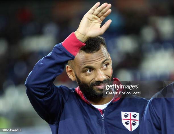 Joao Pedro of Cagliari stands on the pitch with a red mark on his face to symbolise the fight against violence against women ahead ofthe Serie A...