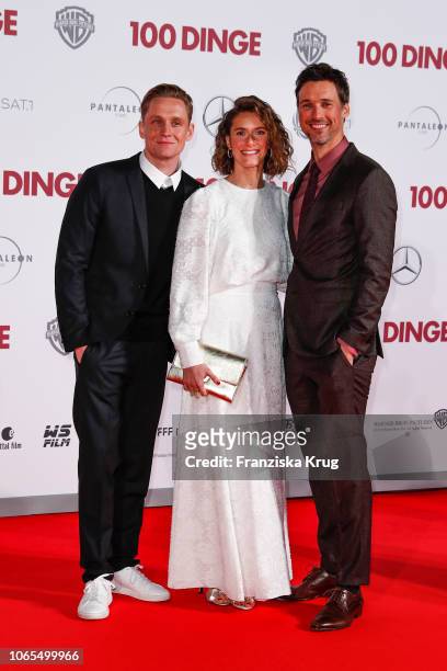 Matthias Schweighoefer, Miriam Stein and Florian David Fitz during the German premiere of the movie '100 Dinge' at CineStar on November 26, 2018 in...