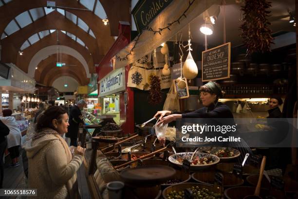 shopping at english market in cork, ireland - cork city ireland stock pictures, royalty-free photos & images