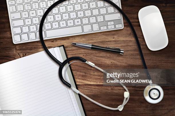 doctor's desk - doctor desk stock pictures, royalty-free photos & images