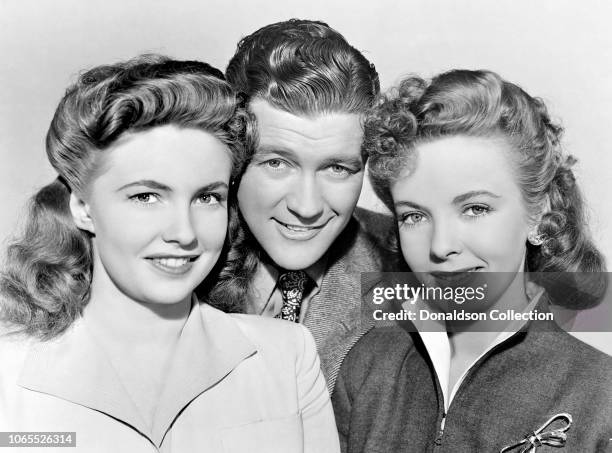 Actress Ida Lupino, Joan Leslie, Dennis Morgan in a scene from the movie "The Hard Way"