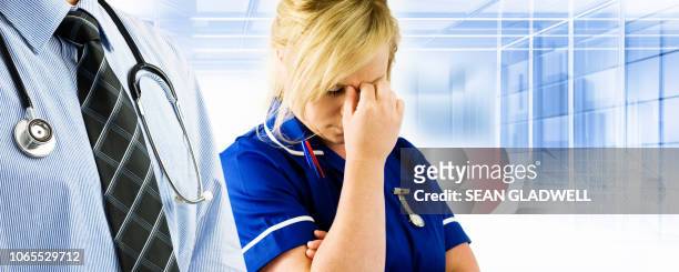 tired nurse - nhs stock pictures, royalty-free photos & images