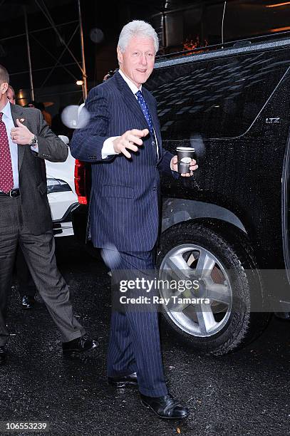 Former United States President Bill Clinton leaves a Midtown Manhattan hotel on November 4, 2010 in New York City.