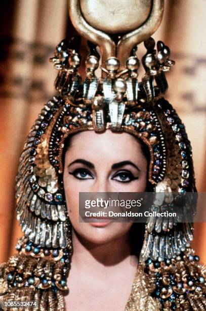 Actress Elizabeth Taylor and Jimmy Lydon in a scene from the movie "Cleopatra"