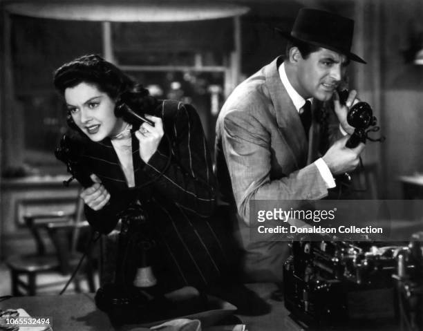 Actress Rosalind Russell and Cary Grant in a scene from the movie "His Girl Friday"