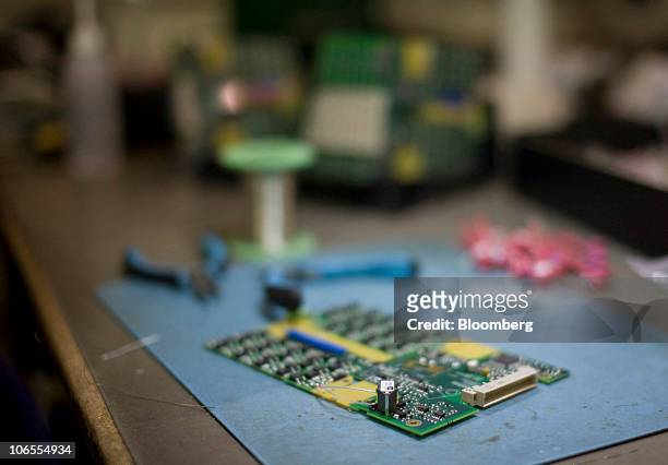 Printed circuit board sits on a desk at Texcel Technology Plc.'s factory in Dartford, U.K., on Thursday, Nov. 4, 2010. The U.K. Faces a budget...