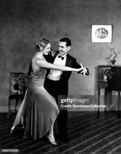 Actress Thelma Todd and Charley Chase in a scene from the movie "Whispering Whoopee"
