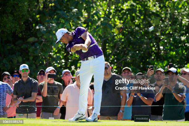 Rickie Fowler of the United States plays his shot from the seventh tee during the second round of the Mayakoba Golf Classic at El Camaleon Mayakoba...