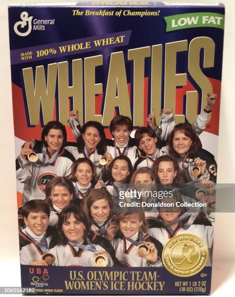 The 1998 gold medal winning US Women's Olympic Hockey team poses for a portrait on a Wheaties cereal box in 1998 .