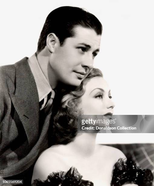 Actress Ann Sothern and Don Ameche in a scene from the movie "Fifty Roads to Town"