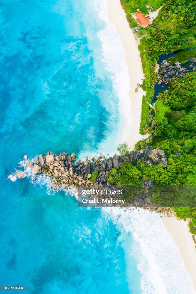 Beach and ocean from above. Aerial view, drone point of view, Seychelles.