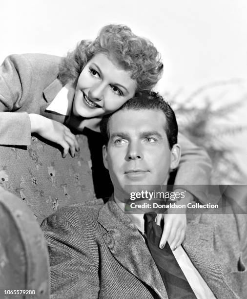 Actress Mary Martini and Fred MacMurray in a scene from the movie "New York Town"