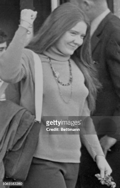 Antiwar activist, Leslie Bacon, accused in the Capitol bombing is seen here leaving the Federal Courthouse in Seattle, with her fist in the air. She...