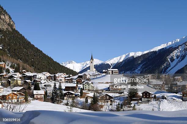 swiss village in winter near davos - davos switzerland stock pictures, royalty-free photos & images
