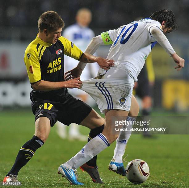 Artem Milevskiy of Dynamo Kiev fights for a ball with Johann Gudmundsson of AZ Alkmaar during their UEFA Europa League, Group E, football match in...