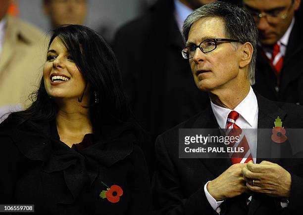 Liverpool co-owner John Henry and his partner Linda Pizzuti take their seats before their UEFA Europa League football match at Anfield in Liverpool,...