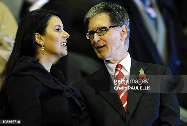 Liverpool co-owner John Henry and his partner Linda Pizzuti take their seats before their UEFA Europa League football match against Napoli at Anfield...