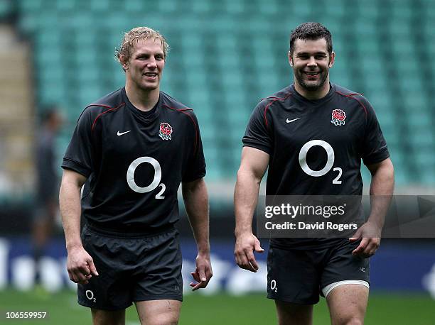 Lewis Moody, the England captain walks off the pitch with Nick Easter during the training session held at Twickenham Stadium on November 5, 2010 in...