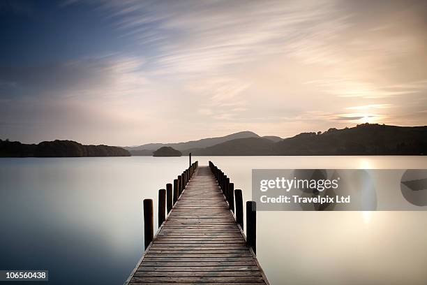 wooden landing jetty on coniston water - jetty stock pictures, royalty-free photos & images