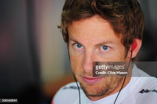 Jenson Button of Great Britain and McLaren Mercedes prepares to drive during practice for the Brazilian Formula One Grand Prix at the Interlagos...