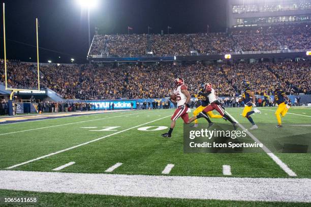 Oklahoma Sooners Running Back Kennedy Brooks runs for a touchdown during the first half of the Oklahoma Sooners versus the West Virginia Mountaineers...