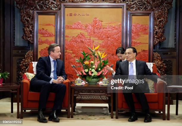 China's Premier Li Keqiang meets former British Prime Minister David Cameron at Zhongnanhai leadership compound on November 27, 2018 in Beijing,...