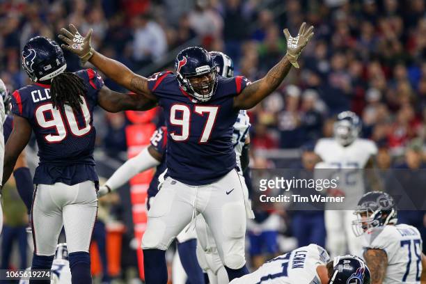 Angelo Blackson of the Houston Texans celebrates after a sack in the third quarter against the Tennessee Titans at NRG Stadium on November 26, 2018...
