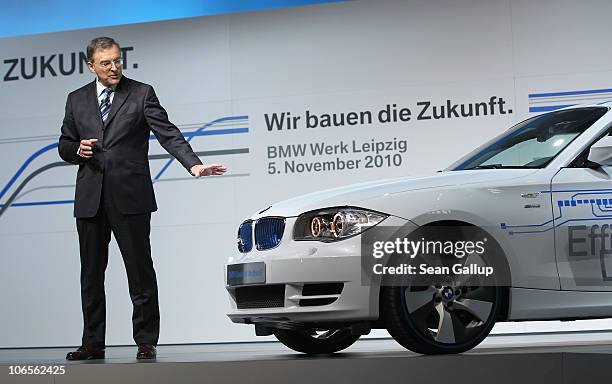 Chairman Norbert Reithofer speaks at the BMW auto assembly plant next to a BMW electric car on November 5, 2010 in Leipzig, Germany. Later Reithofer...