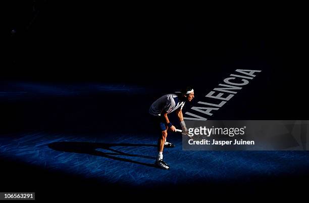 Juan Monaco of Argentina waits for Marcel Granollers of Spain to serve the ball in his quarter final match during the ATP 500 World Tour Valencia...
