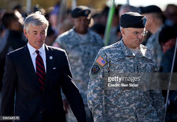 Secretary of the Army John McHugh, left, and U.S. Army Chief of Staff Gen. George Casey presented awards of valor at a memorial service recognizing...