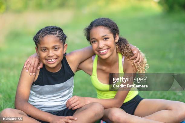sisters and friends - young sister stock pictures, royalty-free photos & images