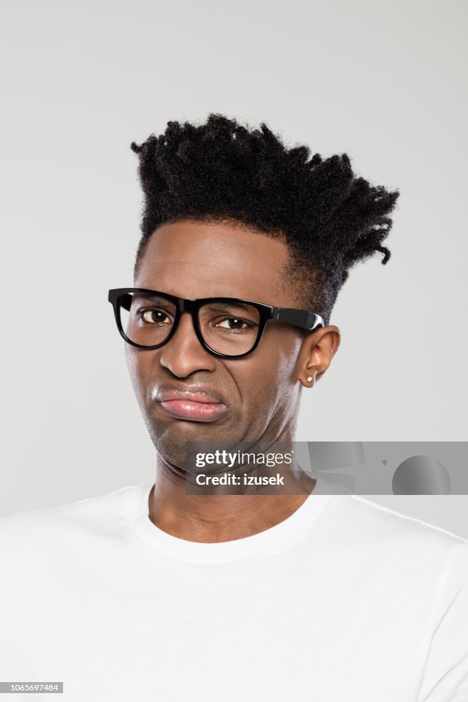 Close up of disgusted afro american man