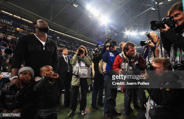 Gerald Asamoah of St. Pauli is honored prior to the Bundesliga match between FC Schalke 04 and FC St. Pauli at Veltins Arena on November 5, 2010 in...