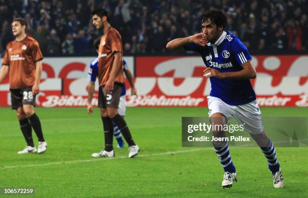 Raul of Schalke celebrates after scoring his team's first goall during the Bundesliga match between FC Schalke 04 and FC St. Pauli at Veltins Arena...