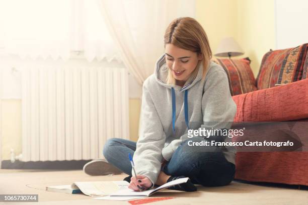 young student - jeans barefoot girl stock pictures, royalty-free photos & images
