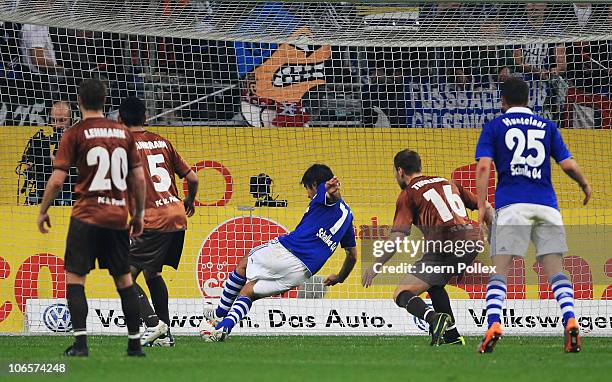 Raul of Schalke scores his team's third goal during the Bundesliga match between FC Schalke 04 and FC St. Pauli at Veltins Arena on November 5, 2010...