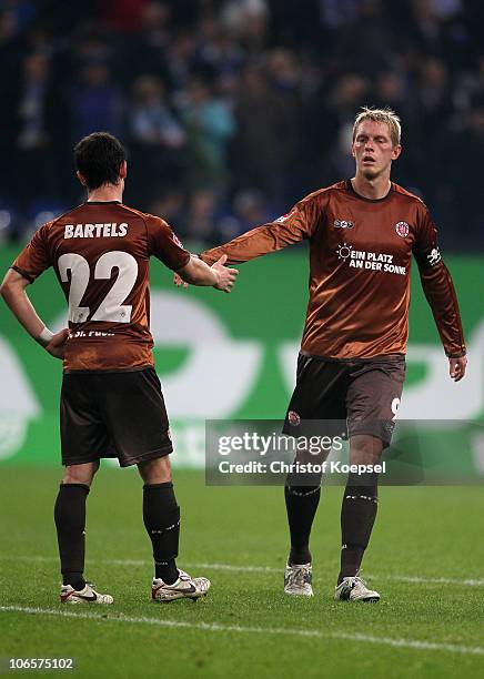 Fin Bartels of Pauli and Marius Ebbers of Pauli look dejected after losing 0-3 the Bundesliga match between FC Schalke 04 and FC St. Pauli at Veltins...